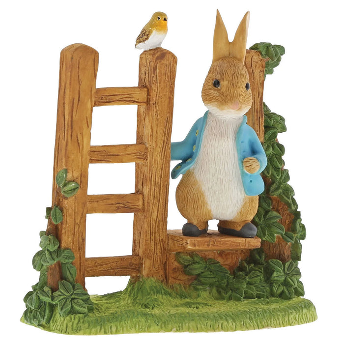 Peter Rabbit on Wooden Stile Figurine by Beatirix Potter SKU: A29835